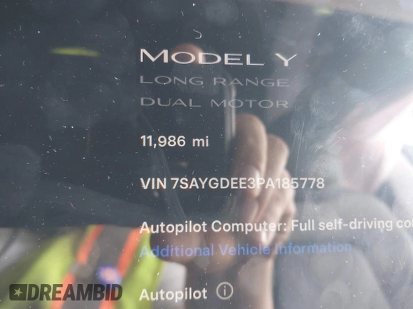 2023 Tesla Model Y Long Range with VIN 7SAYGDEE3PA185778, listed as a IAAI auction lot 39721611 with 11,986 mi miles and . Bid and sale history available at DreamBid. Image 15.