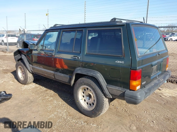 1996 Jeep Cherokee Sport with VIN 1J4FJ68S2TL299150, listed as a IAAI auction lot 41932867 with 142,761 mi miles. Bid and sale history available at carsss.com. Image 3.