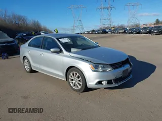 2014 Volkswagen Jetta SE z VIN 3VWD17AJ7EM441818, wystawiony jako IAAI lot #41629768 z przebiegiem 148 767 mil mil oraz . Historia ofert i sprzedaży dostępna na DreamBid. Obrazek 1.