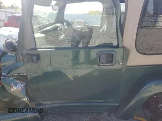 2000 Jeep Wrangler Sahara with VIN 1J4FA59S0YP720856, listed as a Copart auction lot 73128204 with 0 mi miles and Clean Title. Bid and sale history available at carsss.com. Image 7.