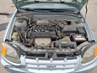 2003 Hyundai Accent GL z VIN KMHCG45C73U481294, wystawiony jako Copart lot #55958005 z przebiegiem 136 964 mil mil oraz Czysty tytuł • Clean title. Historia ofert i sprzedaży dostępna na DreamBid. Obrazek 11.