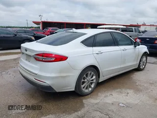 2020 Ford Fusion SE with VIN 3FA6P0H76LR154018, listed as a IAAI auction lot 42175889 with 65,187 mi miles and . Bid and sale history available at DreamBid. Image 4.