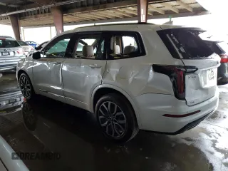 2021 Cadillac XT6 AWD Sport z VIN 1GYKPHRSXMZ195978, wystawiony jako Copart lot #80886314 z przebiegiem Nie podano mil oraz Szkoda całkowita • Salvage title. Historia ofert i sprzedaży dostępna na DreamBid. Obrazek 2.