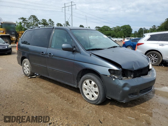2003 Honda Odyssey EX-L with VIN 5FNRL18933B116127, listed as a Copart auction lot 56013645 with 157,118 mi miles and Salvage Title. Bid and sale history available at DreamBid. Image 4.