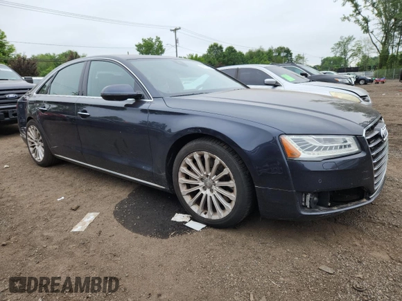 2015 Audi A8 4.0T with VIN WAUJ2AFD6FN011009, listed as a Copart auction lot 64173005 with 153,377 mi miles and Salvage title. Bid and sale history available at DreamBid. Image 4.