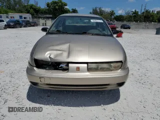 1999 Saturn SL with VIN 1G8ZK5271XZ226783, listed as a Copart auction lot 56467315 with 86,168 mi miles and Salvage title. Bid and sale history available at DreamBid. Image 5.