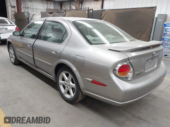 2002 Nissan Maxima GLE with VIN JN1DA31D32T422365, listed as a IAAI auction lot 41644137 with 165,157 mi miles and . Bid and sale history available at DreamBid. Image 3.