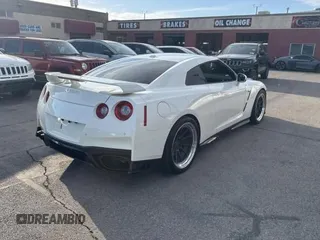 2020 Nissan GT-R Premium z VIN JN1AR5EF7LM100066, wystawiony jako Copart lot #58606645 z przebiegiem 35 824 mil mil oraz Szkody całkowita. Historia ofert i sprzedaży dostępna na DreamBid. Obrazek 4.