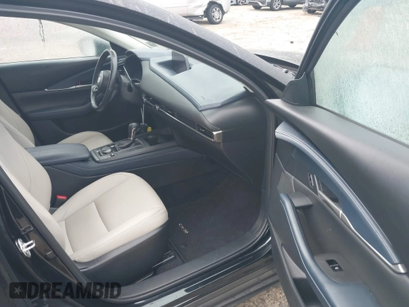 2020 Mazda CX-30 Select with VIN 3MVDMBCL3LM104988, listed as a IAAI auction lot 41951565 with 53,685 mi miles and . Bid and sale history available at DreamBid. Image 5.