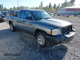 2005 Dodge Dakota ST z VIN 1D7HW22K05S206111, wystawiony jako IAAI lot #42338621 z przebiegiem 159 563 mil mil oraz . Historia ofert i sprzedaży dostępna na DreamBid. Obrazek 1.
