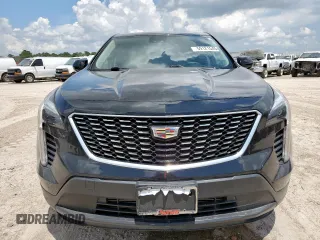 2023 Cadillac XT4 FWD Luxury with VIN 1GYAZAR46PF178003, listed as a Copart auction lot 59121545 with 42,000 mi miles and Salvage title. Bid and sale history available at DreamBid. Image 5.