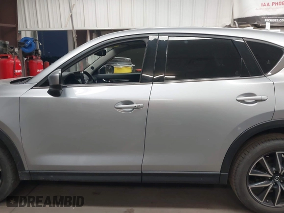 2018 Mazda CX-5 Grand Touring with VIN JM3KFBDM7J0316892, listed as a IAAI auction lot 41885705 with 90,386 mi miles. Bid and sale history available at carsss.com. Image 15.
