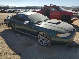 2000 Ford Mustang with VIN 1FAFP4043YF263744, listed as a Copart auction lot 46882165 with Not provided miles and Salvage title. Bid and sale history available at DreamBid. Image 4.