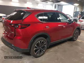 2023 Mazda CX-5 2.5 S Premium Plus Package with VIN JM3KFBEM5P0164568, listed as a IAAI auction lot 41843961 with 22,891 mi miles. Bid and sale history available at carsss.com. Image 4.