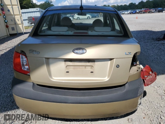 2009 Kia Rio LX with VIN KNADE223996521831, listed as a Copart auction lot 69126284 with 183,796 mi miles and Salvage Title. Bid and sale history available at DreamBid. Image 6.