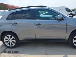 2013 Mitsubishi Outlander SE z VIN 4A4AP4AU5DE003650, wystawiony jako IAAI lot #42063517 z przebiegiem 109 165 mil mil oraz . Historia ofert i sprzedaży dostępna na DreamBid. Obrazek 14.