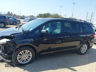 2014 Toyota Sienna XLE with VIN 5TDYK3DC2ES492554, listed as a IAAI auction lot 41685109 with 196,619 mi miles and . Bid and sale history available at DreamBid. Image 14.