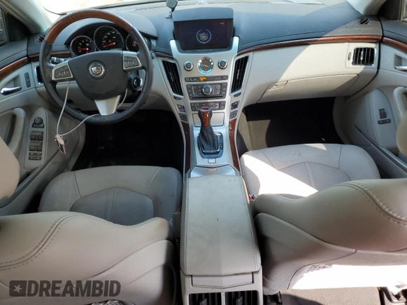 2013 Cadillac CTS Premium с VIN 1G6DP5E34D0151591, выставлен на аукционе Copart как лот 63668325 с пробегом 59 477 миль миль и Списание • Salvage title. История ставок и продаж доступна на DreamBid. Изображение 8.