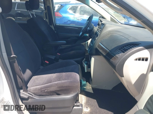 2014 Dodge Grand Caravan American Value with VIN 2C4RDGBG5ER187005, listed as a IAAI auction lot 42018333 with 216,149 mi miles and . Bid and sale history available at DreamBid. Image 5.