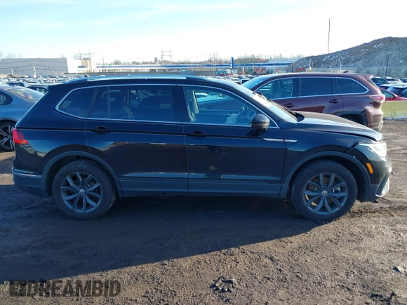2023 Volkswagen Tiguan SE with VIN 3VVMB7AX8PM032557, listed as a IAAI auction lot 41585975 with 28,706 mi miles and . Bid and sale history available at DreamBid. Image 13.