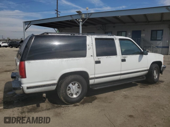 1997 Chevrolet Suburban with VIN 1GNEC16R5VJ301591, listed as a Copart auction lot 75965054 with 213,321 mi miles and Salvage Title. Bid and sale history available at carsss.com. Image 3.