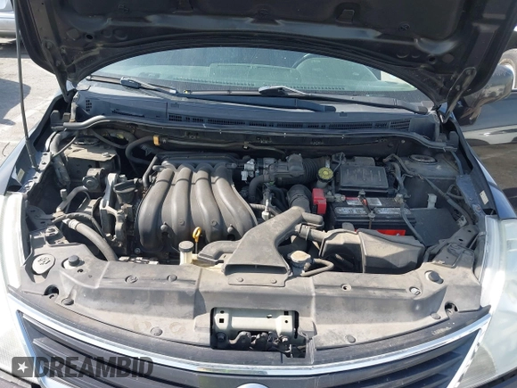 2012 Nissan Versa S with VIN 3N1BC1CP4CK203309, listed as a IAAI auction lot 41614884 with 141,770 mi miles. Bid and sale history available at carsss.com. Image 10.