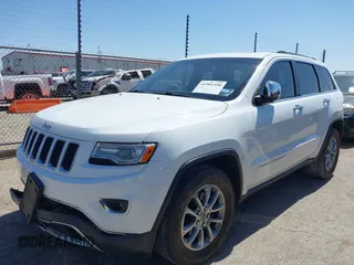2014 Jeep Grand Cherokee Limited with VIN 1C4RJEBG6EC453833, listed as a IAAI auction lot 41901390 with 148,576 mi miles and . Bid and sale history available at DreamBid. Image 2.