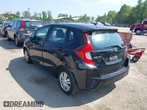 2015 Honda Fit LX z VIN 3HGGK5H51FM724566, wystawiony jako IAAI lot #42151755 z przebiegiem 168 744 mil mil oraz . Historia ofert i sprzedaży dostępna na DreamBid. Obrazek 3.
