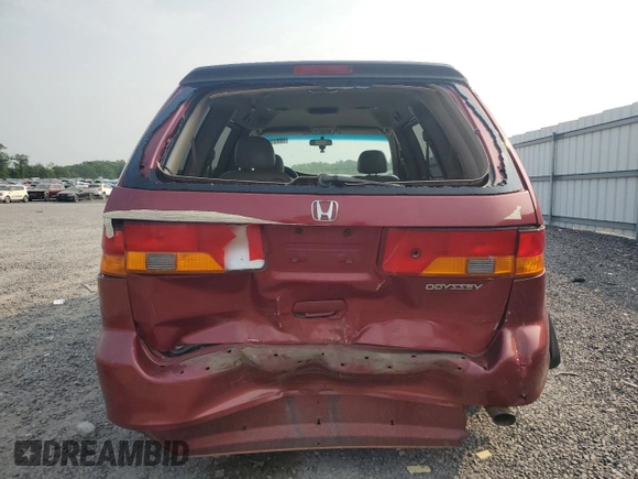 2004 Honda Odyssey EX-L with VIN 5FNRL18024B008617, listed as a Copart auction lot 58831435 with Not provided miles and Salvage title. Bid and sale history available at DreamBid. Image 6.