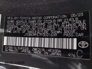 2023 Toyota Corolla Hybrid LE with VIN JTDBCMFE7P3021639, listed as a IAAI auction lot 41026783 with 38,656 mi miles. Bid and sale history available at carsss.com. Image 9.
