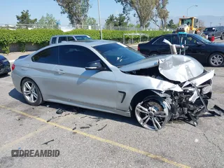 2014 BMW 4 Series 428i xDrive with VIN WBA3N9C54EF721188, listed as a IAAI auction lot 42143305 with Not provided miles and . Bid and sale history available at DreamBid. Image 1.