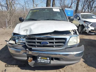 2003 Ford F-150 with VIN 2FTRX17L63CA31923, listed as a IAAI auction lot 41778818 with 107,600 mi miles and . Bid and sale history available at DreamBid. Image 12.