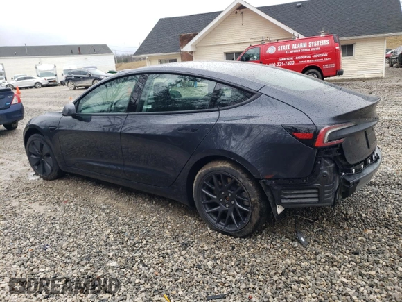 2024 Tesla Model 3 with VIN 5YJ3E1EA7RF858716, listed as a Copart auction lot 49809325 with 9,936 mi miles and Non Repairable. Bid and sale history available at DreamBid. Image 2.