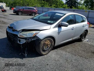 2012 Ford Focus SE z VIN 1FAHP3K20CL219046, wystawiony jako Copart lot #58771285 z przebiegiem 167 703 mil mil oraz Szkoda całkowita • Salvage title. Historia ofert i sprzedaży dostępna na DreamBid. Obrazek 1.
