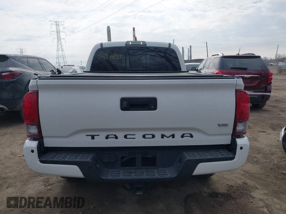 2018 Toyota Tacoma SR5 with VIN 3TMDZ5BN9JM051105, listed as a IAAI auction lot 41708034 with 98,000 mi miles and . Bid and sale history available at DreamBid. Image 16.