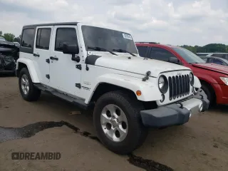 2015 Jeep Wrangler Unlimited Sahara z VIN 1C4BJWEG6FL627890, wystawiony jako Copart lot #58080945 z przebiegiem 145 941 mil mil oraz Szkoda całkowita • Salvage title. Historia ofert i sprzedaży dostępna na DreamBid. Obrazek 4.
