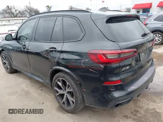 2022 BMW X5 sDrive40i with VIN 5UXCR4C07N9M28669, listed as a IAAI auction lot 41543581 with 59,497 mi miles. Bid and sale history available at carsss.com. Image 3.