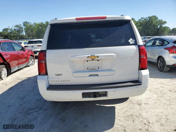 2015 Chevrolet Suburban LT with VIN 1GNSCJKC2FR738634, listed as a Copart auction lot 53527545 with 259,856 mi miles and Salvage Title. Bid and sale history available at carsss.com. Image 6.