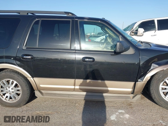 2014 Ford Expedition King Ranch z VIN 1FMJU1J58EEF21353, wystawiony jako IAAI lot #41977079 z przebiegiem 141 225 mil mil oraz . Historia ofert i sprzedaży dostępna na DreamBid. Obrazek 13.