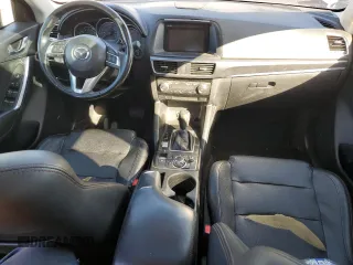 2016 Mazda CX-5 Grand Touring with VIN JM3KE2DY8G0644790, listed as a Copart auction lot 82060424 with 0 mi miles and Clean Title. Bid and sale history available at carsss.com. Image 8.
