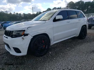 2017 Jeep Grand Cherokee SRT with VIN 1C4RJFDJ1HC869288, listed as a Copart auction lot 74272154 with 139,904 mi miles and Clean Title. Bid and sale history available at carsss.com. Image 1.