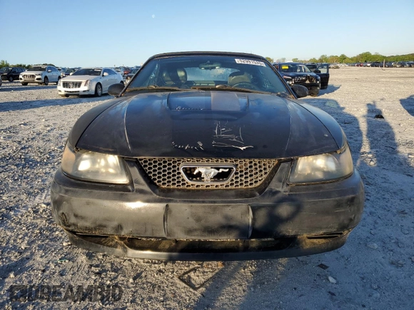 2004 Ford Mustang Deluxe z VIN 1FAFP44654F143868, wystawiony jako Copart lot #52991535 z przebiegiem 167 015 mil mil oraz Czysty tytuł • Clean title. Historia ofert i sprzedaży dostępna na DreamBid. Obrazek 5.