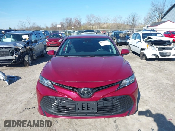 2019 Toyota Camry LE with VIN 4T1B11HK1KU233345, listed as a IAAI auction lot 41971136 with 51,499 mi miles and . Bid and sale history available at DreamBid. Image 13.