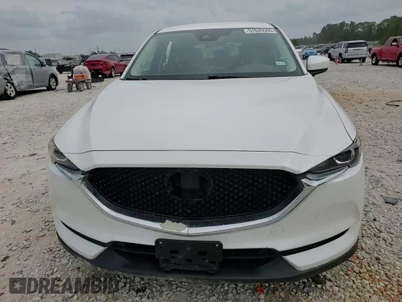 2020 Mazda CX-5 Touring z VIN JM3KFACM6L0787687, wystawiony jako Copart lot #57639555 z przebiegiem 91 219 mil mil oraz Szkoda całkowita • Salvage title. Historia ofert i sprzedaży dostępna na DreamBid. Obrazek 14.