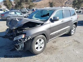 2017 Jeep Grand Cherokee Laredo with VIN 1C4RJEAG8HC944037, listed as a IAAI auction lot 41299619 with 140,405 mi miles. Bid and sale history available at carsss.com. Image 2.