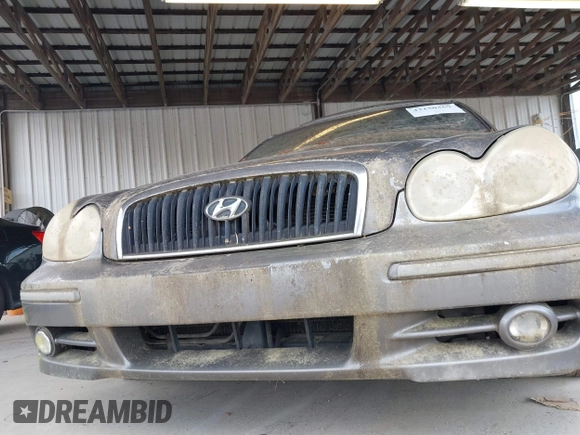 2004 Hyundai Sonata GLS with VIN KMHWF35H64A957365, listed as a IAAI auction lot 42150369 with 247,348 mi miles. Bid and sale history available at carsss.com. Image 12.