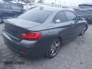 2016 BMW 2 Series M235i with VIN WBA1J7C50GV360395, listed as a IAAI auction lot 41158426 with 81,208 mi miles. Bid and sale history available at carsss.com. Image 4.