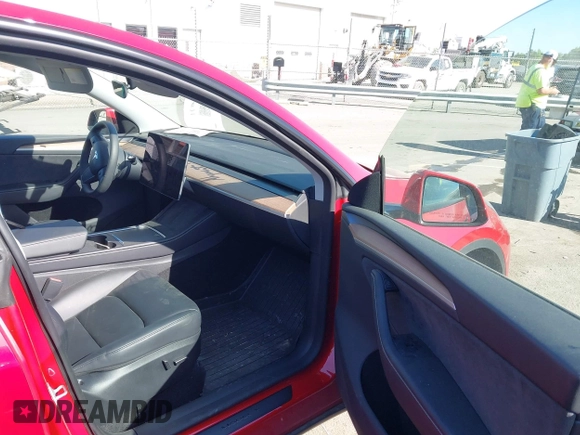 2023 Tesla Model Y Long Range with VIN 7SAYGDEEXPA182702, listed as a IAAI auction lot 42023730 with Not provided miles and . Bid and sale history available at DreamBid. Image 5.