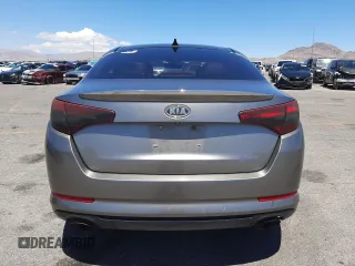 2012 Kia Optima SX z VIN 5XXGR4A60CG044520, wystawiony jako Copart lot #56013155 z przebiegiem 155 487 mil mil oraz Szkoda całkowita • Salvage title. Historia ofert i sprzedaży dostępna na DreamBid. Obrazek 6.