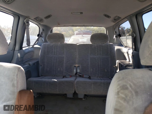 2002 Toyota Sienna LE with VIN 4T3ZF13C22U465170, listed as a Copart auction lot 76561124 with 218,314 mi miles and Clean Title. Bid and sale history available at carsss.com. Image 10.